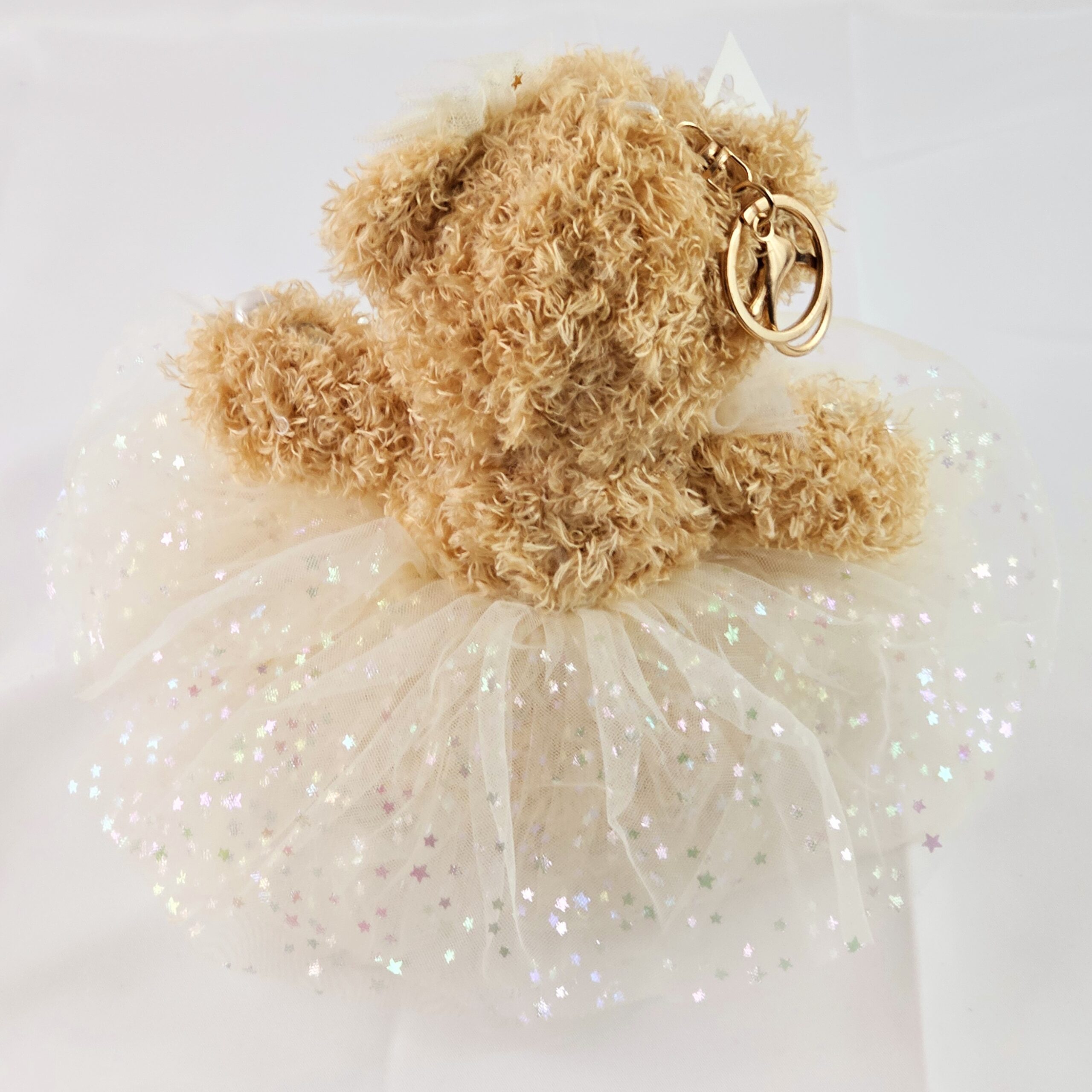 light brown bear with tutu